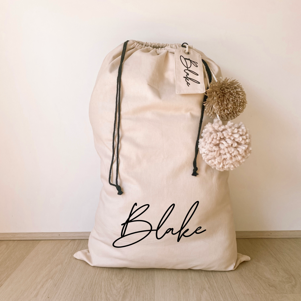 Vintage Christmas sack. Vintage Santa sack. Personalised pom Pom Christmas canvas Santa sack. Custom Christmas neutral Pom Pom present sack. Minimalist pom Pom Christmas sack. Cottagecore Name Christmas Santa sack. Personalised beige sack with Pom Poms. Personalised Cottagecore neutral santa sack.