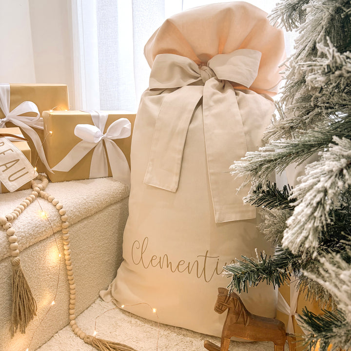 Personalised Santa Sack, Personalised Christmas Sack, Bow Santa Sack, Personalised Bow Sack, Extra Large Santa Sack, Large Santa Sack, Kids Santa Sack, Christmas Gift Sack, Personalised Christmas Gift, Christmas Eve Sack, Reusable Santa Sack, Canvas Santa Sack, Neutral Christmas Decor, Beige Santa Sack, Warm Sand Santa Sack, Vintage Christmas Decor, Traditional Christmas Decor, Christmas Keepsake, Kids Christmas Decor, Girls Santa Sack, Boys Santa Sack, Custom Name Santa Sack, Australian Christmas, Christma