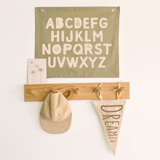 Sage green kids room. Sage green nursery decor. Sage green Alphabet kids banner. Baby green abc banner. Boys alphabet wall banner. Surf boys blue bedroom styling. Boys calm surf bedroom decor. Boys surf bedroom wall banner. Boys fun surf room inspo. Beach boys bedroom inspo. Beach boys bedroom ideas. Coastal boys bedroom inspo. ABC wall banner. Pastel green boys bedroom decor.