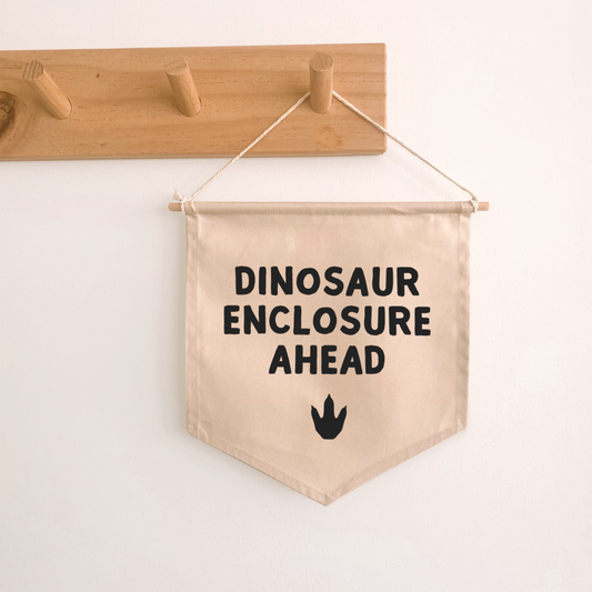 Dinosaur enclosure ahead hanging banner ~ Warm sand