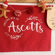 personalised Christmas banner, family Christmas banner, custom surname banner, Christmas wall hanging, personalised family decor, red Christmas decor, traditional Christmas decor, custom family sign, Christmas keepsake, Australian made Christmas decor, handmade Christmas banner, festive wall hanging, family name banner, personalised Christmas decorations, Christmas wall decor, reusable Christmas decor, family Christmas keepsake, red wall banner
