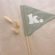 Sage green personalised pennant flag, Fern green initial pennant, Personalised kids room decor, Personalised nursery decor, Alphabet initial flag, Sage nursery decor, Green kids bedroom decor, Earthy nursery decor, Fern green kids decor, Nature-inspired nursery, Neutral personalised decor, Kids initial decor, Fabric pennant flag, Rental-friendly kids decor, Australian kids decor, Hello Saturday Kids Decor