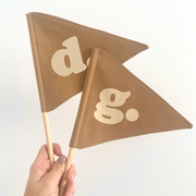 Tan personalised pennant flag, Camel initial pennant, Personalised kids room decor, Personalised nursery decor, Alphabet initial flag, Tan nursery decor, Camel kids bedroom decor, Warm neutral nursery decor, Brown kids room decor, Beige nursery accessories, Neutral personalised decor, Kids name initial decor, Fabric pennant flag, Rental-friendly kids decor, Australian kids decor, Hello Saturday Kids Decor