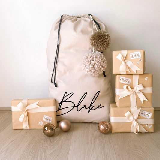 Vintage Christmas sack. Vintage Santa sack. Personalised pom Pom Christmas canvas Santa sack. Custom Christmas neutral Pom Pom present sack. Minimalist pom Pom Christmas sack. Cottagecore Name Christmas Santa sack. Personalised beige sack with Pom Poms. Personalised Cottagecore neutral santa sack. 