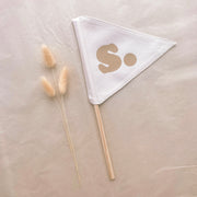 Neutral personalised pennant flag, Natural initial pennant, Personalised kids room decor, Personalised nursery decor, Alphabet initial flag, Neutral nursery decor, Beige kids bedroom decor, Natural kids room decor, Gender-neutral nursery decor, Minimal nursery accessories, Neutral personalised decor, Kids initial decor, Fabric pennant flag, Rental-friendly kids decor, Australian kids decor, Hello Saturday Kids Decor