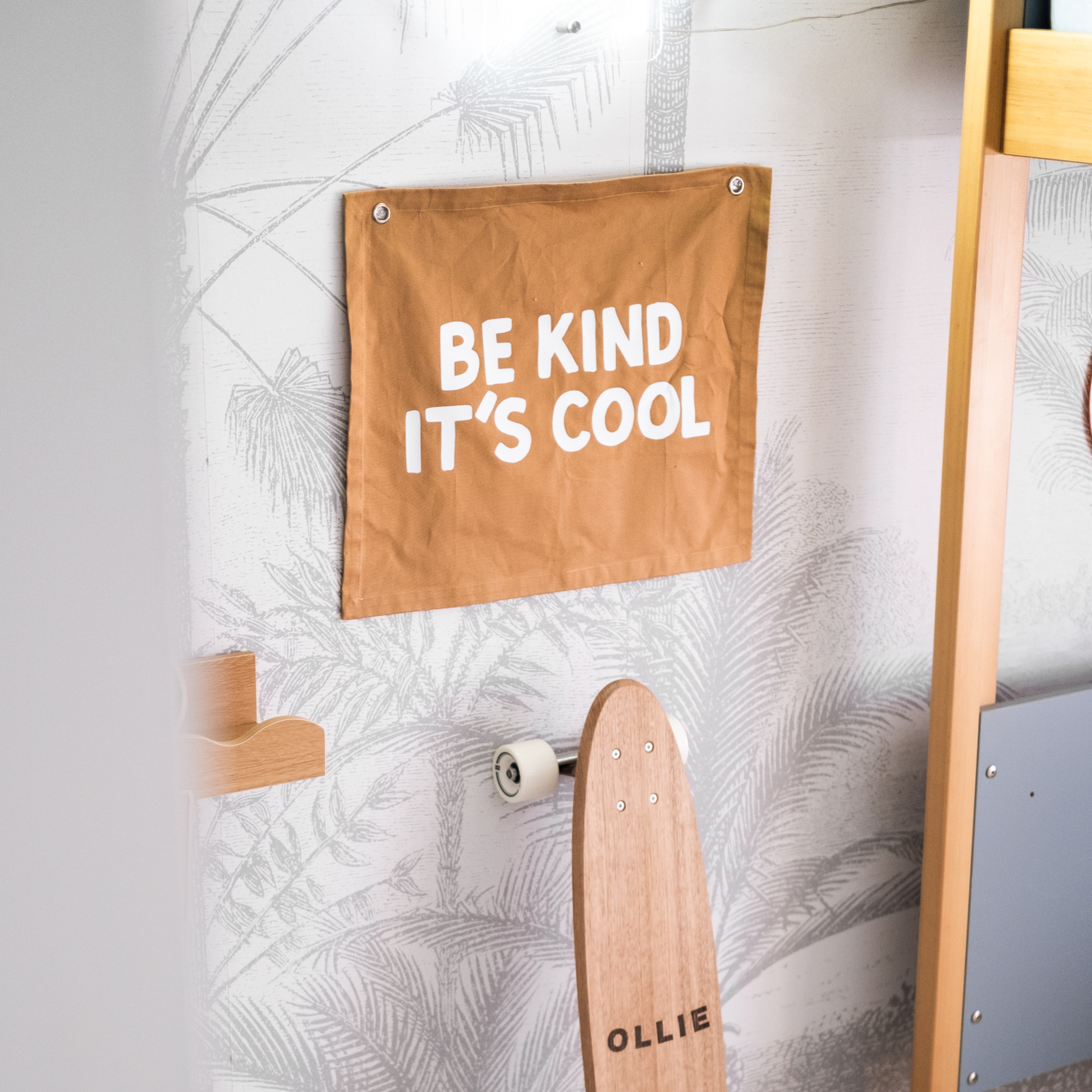 Be kind it’s cool tan boys bedroom wall banner in styled boys bedroom from left 