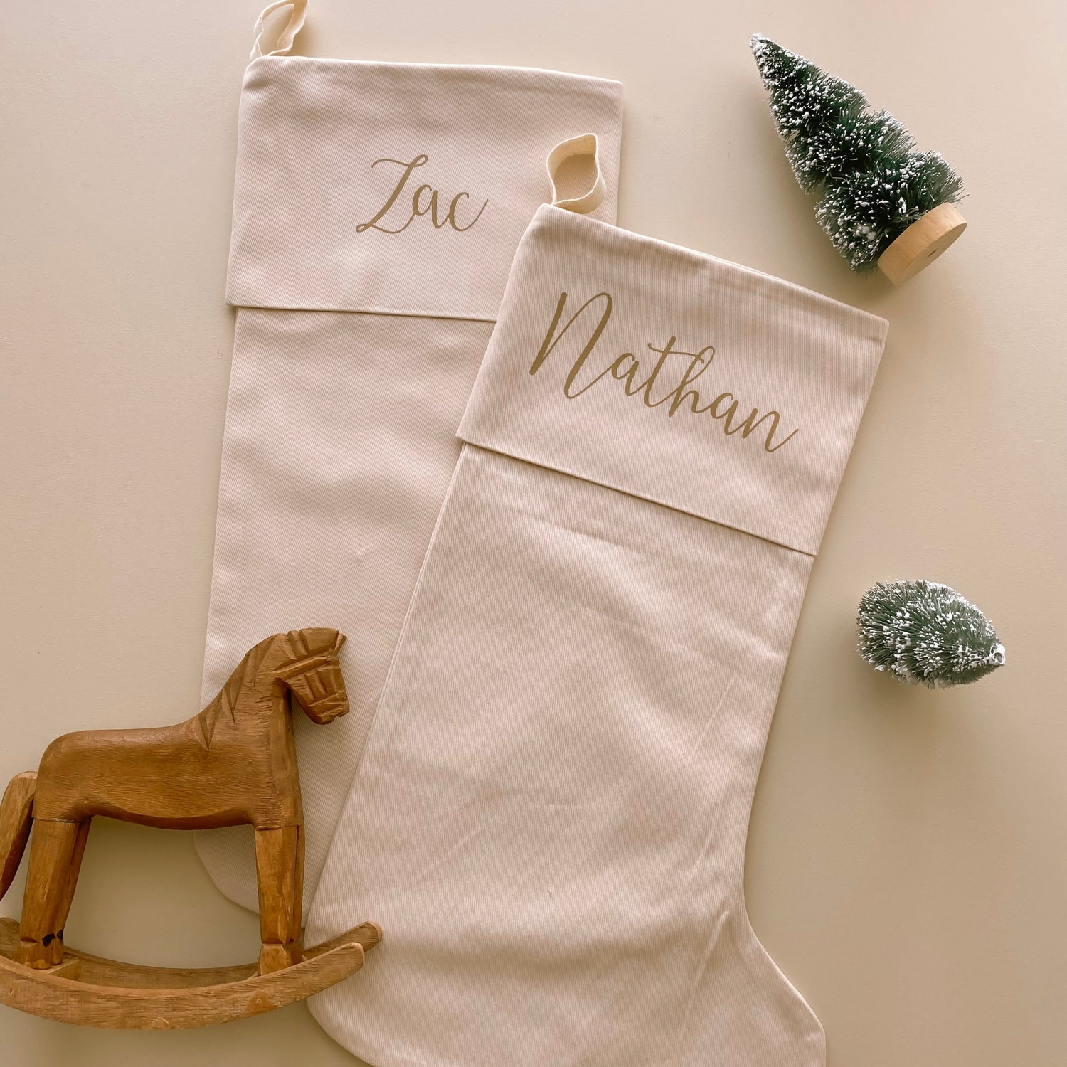 personalised Christmas stocking, warm sand Christmas stocking, beige Christmas stocking, natural Christmas stocking, neutral Christmas stocking, classic Christmas stocking, personalised kids stocking, personalised family stocking, canvas Christmas stocking, cotton Christmas stocking, custom name stocking, neutral Christmas decor, natural Christmas decor, coastal Christmas decor, Christmas keepsake, reusable Christmas stocking, children’s Christmas stocking, Australian Christmas decor