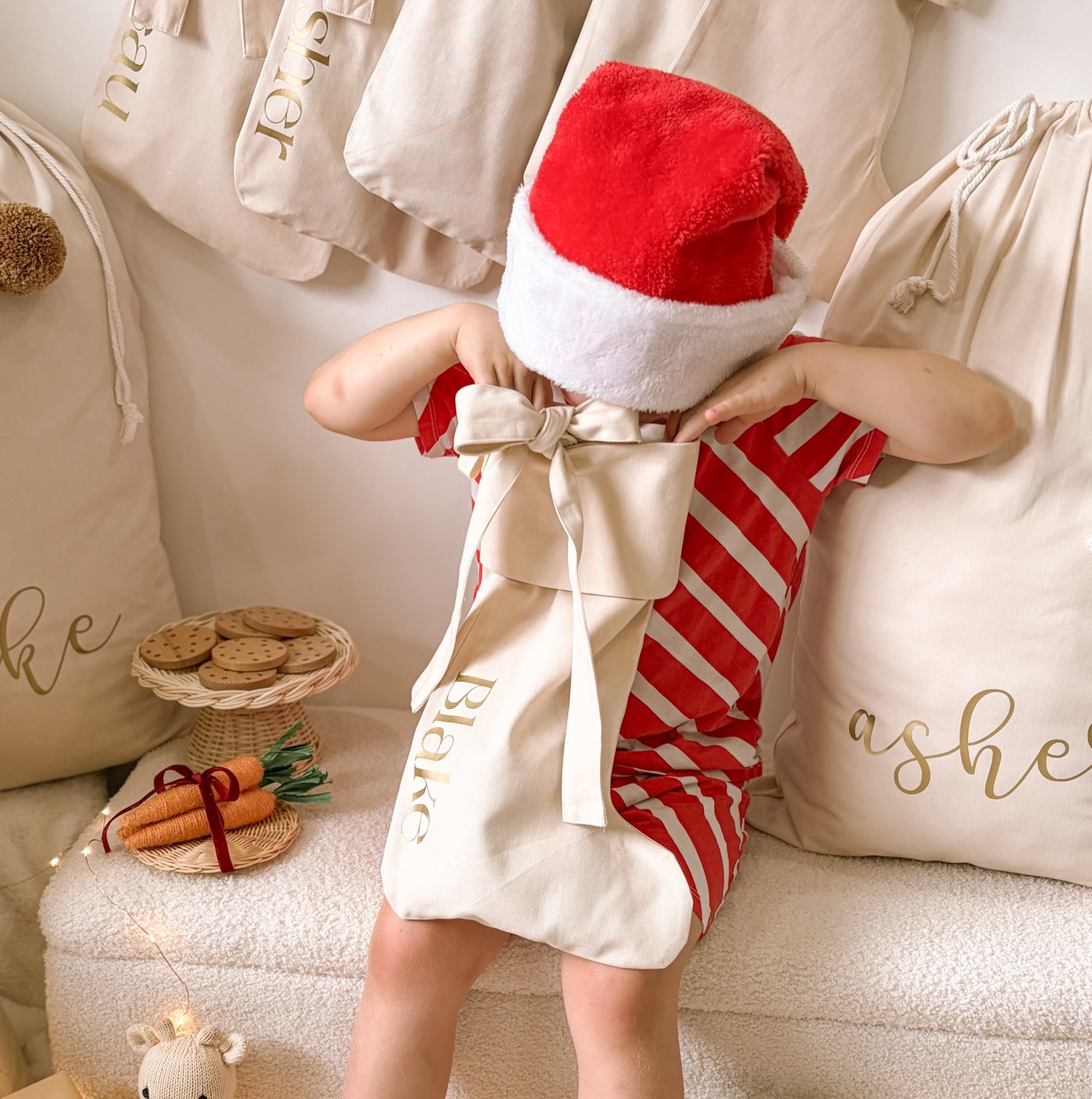 personalised bow Christmas stocking, warm sand Christmas stocking, beige bow stocking, neutral Christmas stocking, personalised Christmas stocking, removable bow stocking, oversized bow stocking, canvas Christmas stocking, cotton Christmas stocking, custom name stocking, personalised kids stocking, neutral Christmas decor, natural Christmas decor, cottagecore Christmas decor, vintage Christmas stocking, Christmas keepsake, reusable Christmas stocking, Australian Christmas decor