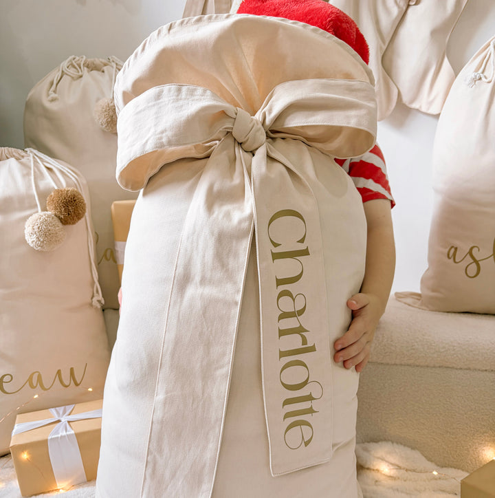 Personalised Santa Sack, Personalised Christmas Sack, Bow Santa Sack, Personalised Bow Sack, Extra Large Santa Sack, Large Santa Sack, Kids Santa Sack, Christmas Gift Sack, Personalised Christmas Gift, Christmas Eve Sack, Reusable Santa Sack, Canvas Santa Sack, Neutral Christmas Decor, Beige Santa Sack, Warm Sand Santa Sack, Vintage Christmas Decor, Traditional Christmas Decor, Christmas Keepsake, Kids Christmas Decor, Girls Santa Sack, Boys Santa Sack, Custom Name Santa Sack, Australian Christmas Christmas