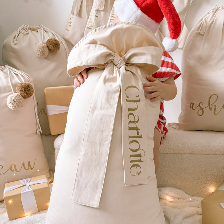 Personalised Santa Sack, Personalised Christmas Sack, Bow Santa Sack, Personalised Bow Sack, Extra Large Santa Sack, Large Santa Sack, Kids Santa Sack, Christmas Gift Sack, Personalised Christmas Gift, Christmas Eve Sack, Reusable Santa Sack, Canvas Santa Sack, Neutral Christmas Decor, Beige Santa Sack, Warm Sand Santa Sack, Vintage Christmas Decor, Traditional Christmas Decor, Christmas Keepsake, Kids Christmas Decor, Girls Santa Sack, Boys Santa Sack, Custom Name Santa Sack, Australian Christmas Christmas