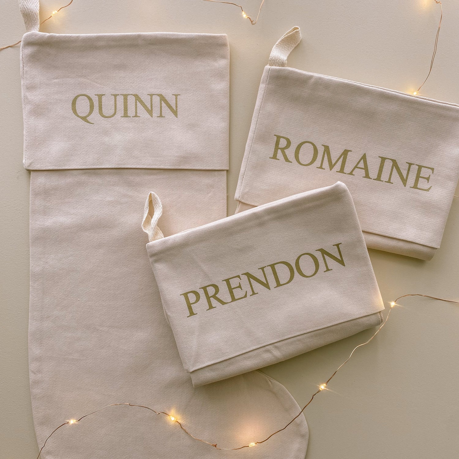 personalised Christmas stocking, warm sand Christmas stocking, beige Christmas stocking, natural Christmas stocking, neutral Christmas stocking, classic Christmas stocking, personalised kids stocking, personalised family stocking, canvas Christmas stocking, cotton Christmas stocking, custom name stocking, neutral Christmas decor, natural Christmas decor, coastal Christmas decor, Christmas keepsake, reusable Christmas stocking, children’s Christmas stocking, Australian Christmas decor