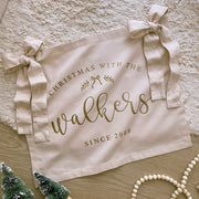 personalised Christmas banner, family Christmas banner, custom family sign, Christmas wall hanging, personalised family decor, Christmas decorations, custom surname banner, family name sign, since year banner, Christmas keepsake, traditional Christmas decor, neutral Christmas decor, canvas wall banner, Australian Christmas decor, festive wall hanging, Christmas bows, personalised Christmas decor, family gift idea