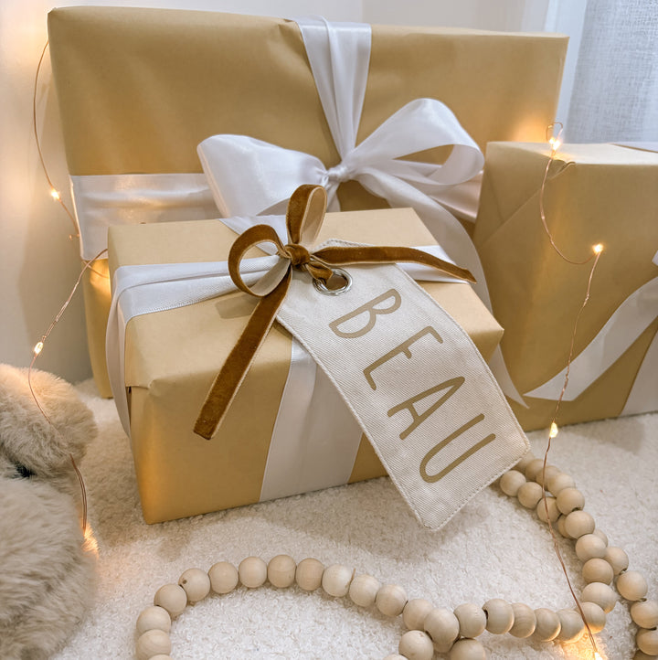 personalised Christmas gift tag, reusable canvas gift tag, personalised gift tag, Christmas present tag, fabric gift tag, canvas name tag, personalised name tag, reusable present tag, Christmas gift wrapping, neutral Christmas decor, warm sand gift tag, beige Christmas tag, vintage Christmas decor, kids Christmas gift tag, custom Christmas tag, personalised Christmas decor, sustainable gift wrapping, Christmas keepsake, stocking tag, Santa sack tag, Australian Christmas gifts