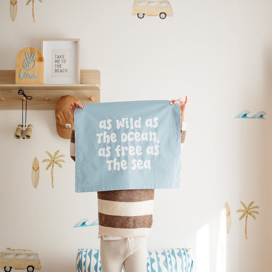 Pastel blue kids room. Soft blue nursery decor. Surf Boys bedroom styling. Boys baby blue surf bedroom decor. Boys blue surf bedroom wall banner. Boys surf room inspo. Beach boys bedroom inspo. Coastal boys bedroom ideas. Coastal boys bedroom banner. Boys wall banner. Ocean boys bedroom decor. Surf nursery decor. Blue surfy bedroom.