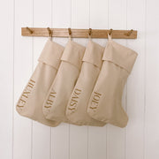 personalised Christmas stocking, warm sand Christmas stocking, beige Christmas stocking, natural Christmas stocking, neutral Christmas stocking, classic Christmas stocking, personalised kids stocking, personalised family stocking, canvas Christmas stocking, cotton Christmas stocking, custom name stocking, neutral Christmas decor, natural Christmas decor, coastal Christmas decor, Christmas keepsake, reusable Christmas stocking, children’s Christmas stocking, Australian Christmas decor
