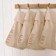 personalised Christmas stocking, warm sand Christmas stocking, beige Christmas stocking, natural Christmas stocking, neutral Christmas stocking, classic Christmas stocking, personalised kids stocking, personalised family stocking, canvas Christmas stocking, cotton Christmas stocking, custom name stocking, neutral Christmas decor, natural Christmas decor, coastal Christmas decor, Christmas keepsake, reusable Christmas stocking, children’s Christmas stocking, Australian Christmas decor