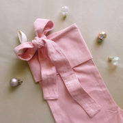 personalised pink bow Christmas stocking, pink Christmas stocking, personalised Christmas stocking, removable bow stocking, oversized bow stocking, canvas Christmas stocking, cotton Christmas stocking, custom name stocking, personalised kids stocking, pink Christmas decor, pastel Christmas decor, colourful Christmas decor, whimsical Christmas decor, cottagecore Christmas stocking, vintage Christmas stocking, Christmas keepsake, reusable Christmas stocking, Australian Christmas decor