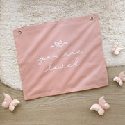 You Are Loved banner. Girls bedroom decor. Affirmation wall decor. Girls nursery sign. Dainty playroom styling. Pretty girls room wall hanging. Kids rental friendly decor. Girls bedroom wall banner. Playroom wall decor. Kids bedroom inspo. Kids playroom ideas.