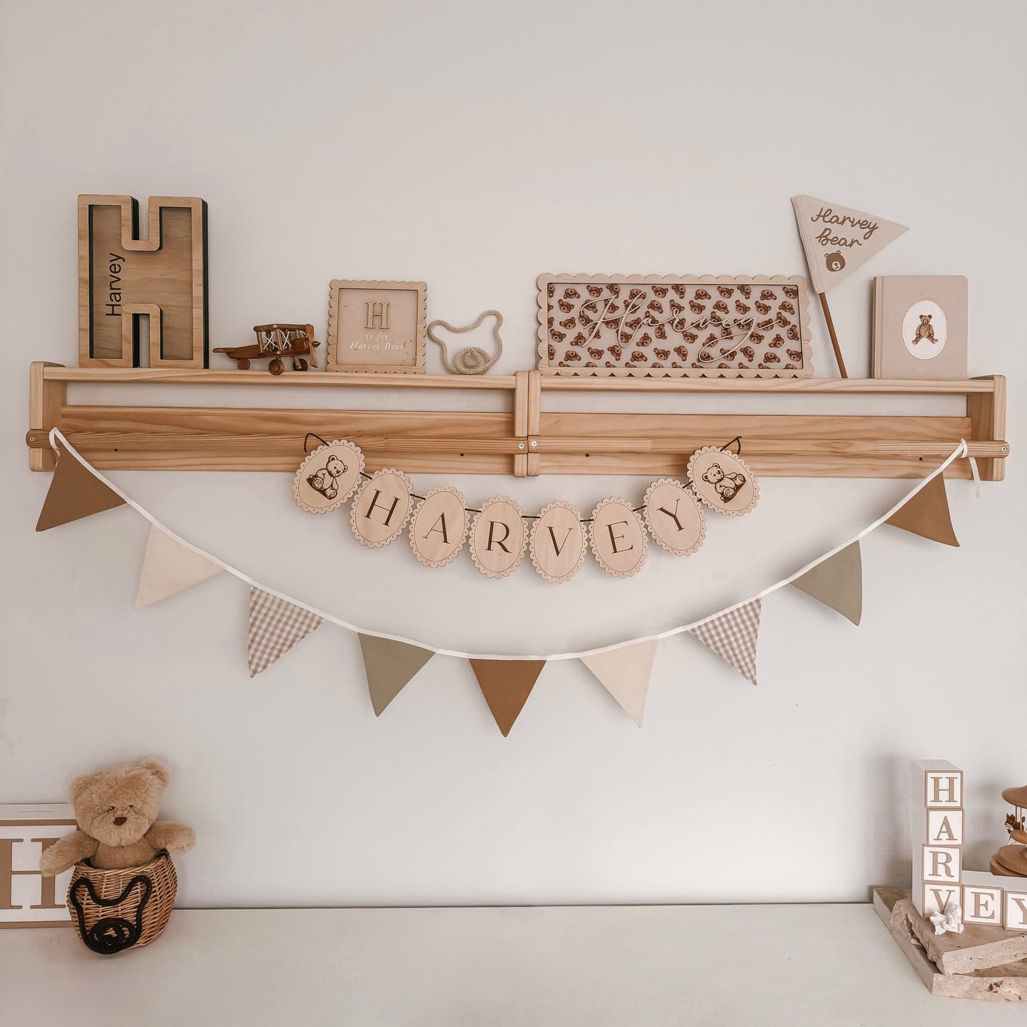 Vintage triangle bunting. Boys nursery decor. Neutral boys bedroom styling. Green and beige bunting flags. Gingham nursery bunting. Retro boys room decor. Earthy nursery wall decor. Kids rental friendly decor. Classic boys nursery inspo. Timeless kids room bunting.
