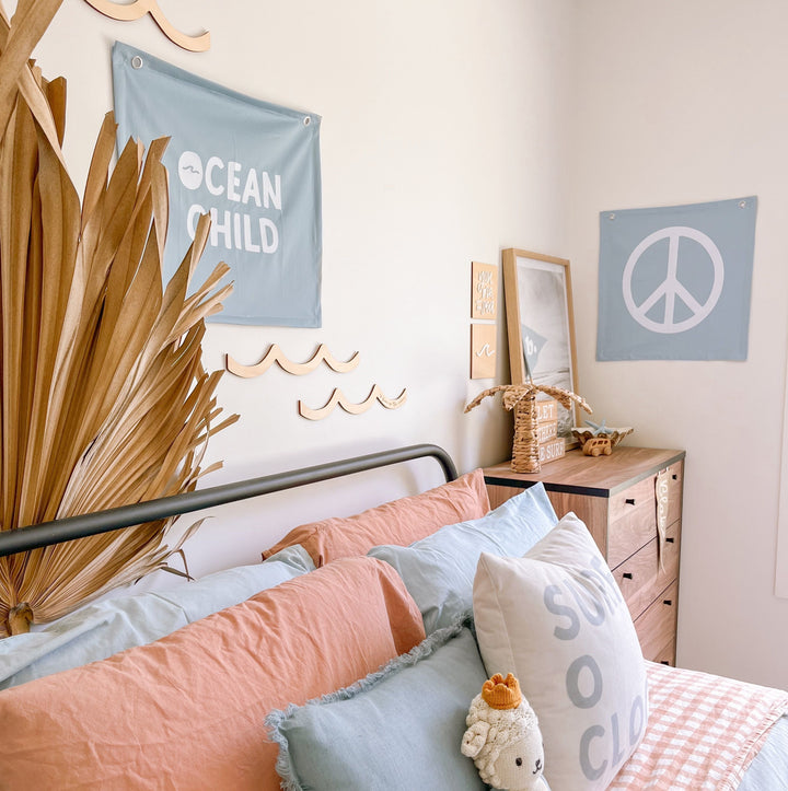 Pastel blue kids room. Soft blue nursery decor. Sky blue ocean child kids banner. Baby blue ocean banner. Boys ocean wall banner. Surf boys blue bedroom styling. Boys calm surf bedroom decor. Boys surf bedroom wall banner. Boys fun surf room inspo. Beach boys bedroom inspo. Beach boys bedroom ideas. Coastal boys bedroom inspo. Coastal wall banner. Pastel blue boys bedroom decor.