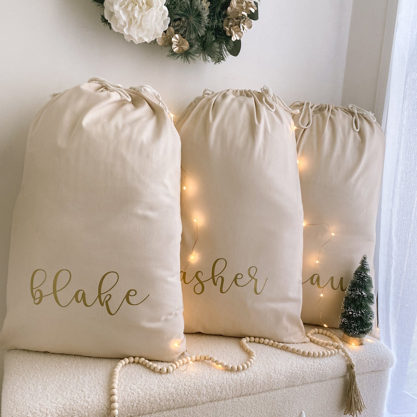 Vintage Christmas sack. Vintage Santa sack. Personalised pom Pom Christmas canvas Santa sack. Custom Christmas neutral Pom Pom present sack. Minimalist pom Pom Christmas sack. Cottagecore Name Christmas Santa sack. Personalised beige sack with Pom Poms. Personalised Cottagecore neutral santa sack. 