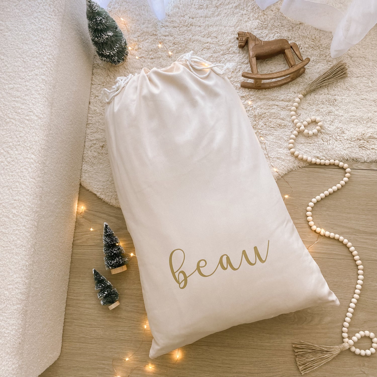 Vintage Christmas sack. Vintage Santa sack. Personalised pom Pom Christmas canvas Santa sack. Custom Christmas neutral Pom Pom present sack. Minimalist pom Pom Christmas sack. Cottagecore Name Christmas Santa sack. Personalised beige sack with Pom Poms. Personalised Cottagecore neutral santa sack. 