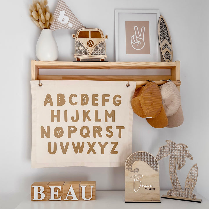 Gender neutral kids room. Gender neutral nursery decor. Neutral Beige Alphabet kids banner. Boys abc banner. Boys alphabet wall banner. Surf boys bedroom styling. Boys surf bedroom decor. Boys surf bedroom wall banner. Boys surf room inspo. Beach boys bedroom inspo. Beach boys bedroom ideas. Coastal boys bedroom inspo. ABC wall banner. Neutral boys bedroom decor.