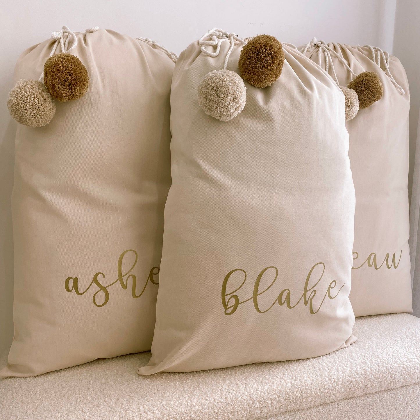 Vintage Christmas sack. Vintage Santa sack. Personalised pom Pom Christmas canvas Santa sack. Custom Christmas neutral Pom Pom present sack. Minimalist pom Pom Christmas sack. Cottagecore Name Christmas Santa sack. Personalised beige sack with Pom Poms. Personalised Cottagecore neutral santa sack. 