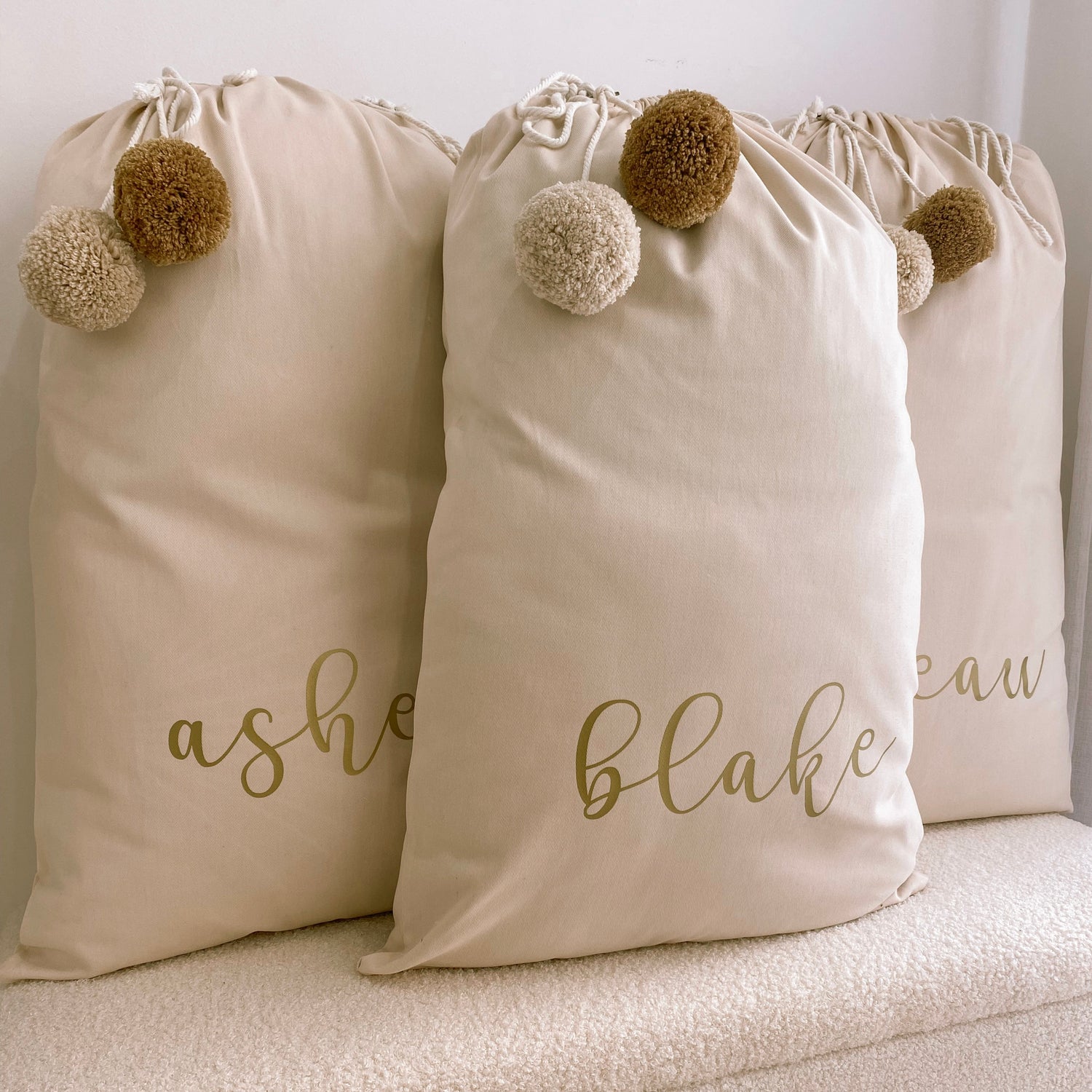 Vintage Christmas sack. Vintage Santa sack. Personalised pom Pom Christmas canvas Santa sack. Custom Christmas neutral Pom Pom present sack. Minimalist pom Pom Christmas sack. Cottagecore Name Christmas Santa sack. Personalised beige sack with Pom Poms. Personalised Cottagecore neutral santa sack. 
