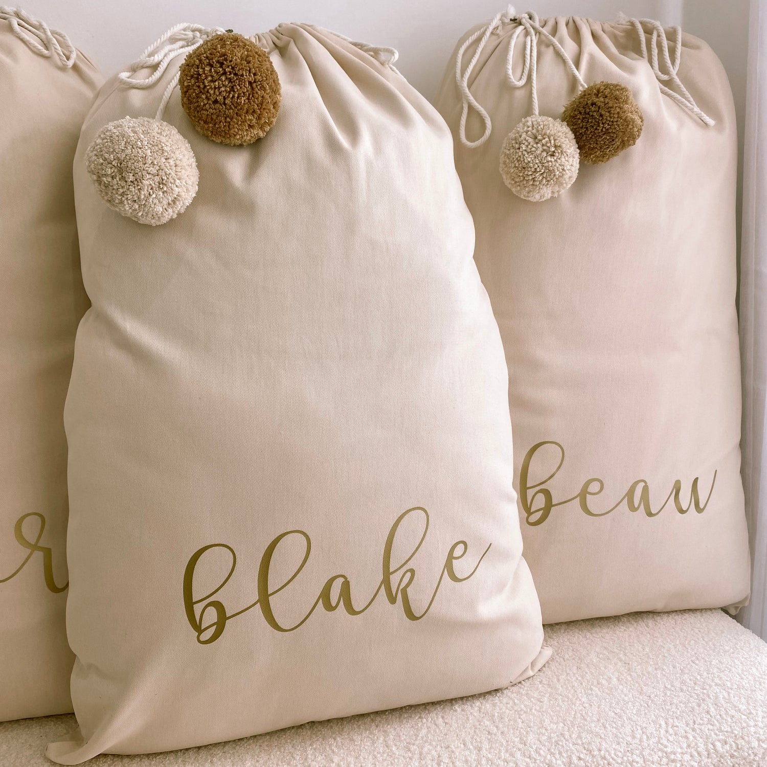 Vintage Christmas sack. Vintage Santa sack. Personalised pom Pom Christmas canvas Santa sack. Custom Christmas neutral Pom Pom present sack. Minimalist pom Pom Christmas sack. Cottagecore Name Christmas Santa sack. Personalised beige sack with Pom Poms. Personalised Cottagecore neutral santa sack. 
