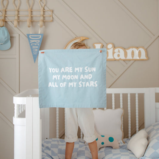 You are my sun, moon and all my stars wall banner. Boys bedroom styling. Boys bedroom wall decor. Boys bedroom wall banner. Boys bedroom inspo. Nursery decor ideas. Celestial nursery banner. Nursery wall decor. Sun moon and stars room inspo. Gender neutral bedroom decor. Space playroom decor.