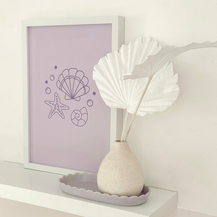 Purple girls room. Soft purple nursery decor. Classic girls bedroom styling. Sweet pastel purple bedroom decor. Seashell wall art. Whimsical girls room inspo. Magical girls bedroom decor. Mermaid inspired print decor. Timeless girls purple bedroom ideas. Elegant girls bedroom art. Girls feminine bedroom. Baby purple girls bedroom decor. Classic girls nursery decor. Classic purple bedroom. Delicate whimsical coastal inspired girls decor.