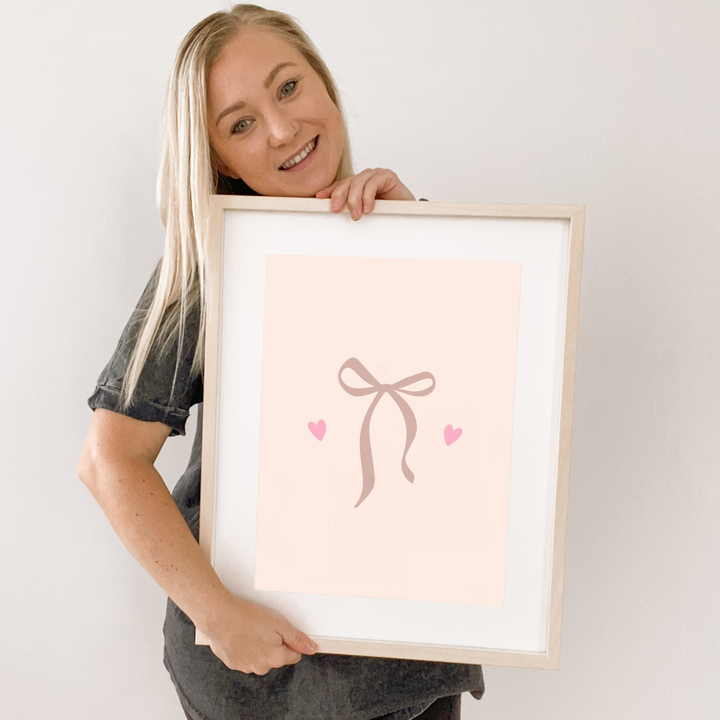 Pink girls room. Soft pink nursery decor. Vintage girls bedroom styling. Classic girls pastel pink bedroom decor. Girls bow wall art. Vintage girls room inspo. Bow girls bedroom inspo. Timeless girls pink bedroom ideas. Elegant girls bedroom art. Girls feminine bedroom. Baby pink girls bedroom decor. Vintage girls nursery decor. Classic pink bedroom. Delicate bow print decor.