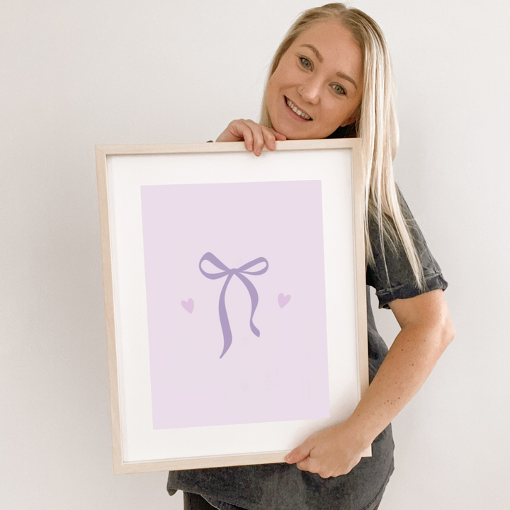 Purple girls room. Soft purple nursery decor. Vintage girls bedroom styling. Classic girls pastel purple bedroom decor. Girls bow wall art. Vintage girls room inspo. Bow girls bedroom inspo. Timeless girls purple bedroom ideas. Elegant girls bedroom art. Girls feminine bedroom. Baby purple girls bedroom decor. Vintage girls nursery decor. Classic purple bedroom. Delicate bow print decor.