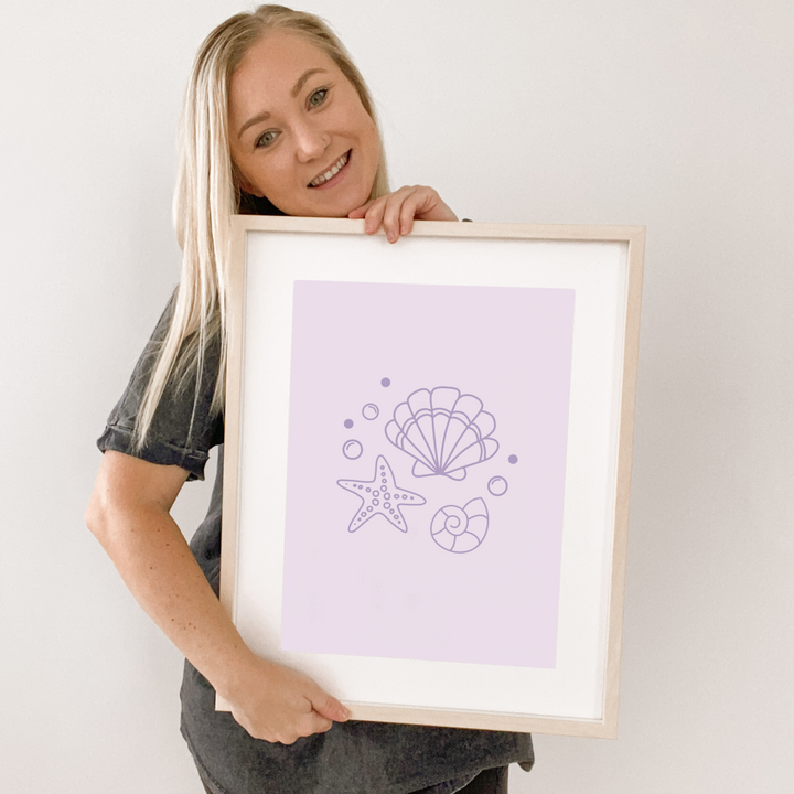 Purple girls room. Soft purple nursery decor. Classic girls bedroom styling. Sweet pastel purple bedroom decor. Seashell wall art. Whimsical girls room inspo. Magical girls bedroom decor. Mermaid inspired print decor. Timeless girls purple bedroom ideas. Elegant girls bedroom art. Girls feminine bedroom. Baby purple girls bedroom decor. Classic girls nursery decor. Classic purple bedroom. Delicate whimsical coastal inspired girls decor.