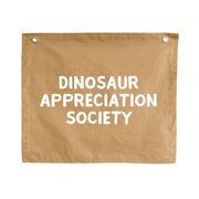 Neutral tan Dinosaur appreciation wall banner. Tan Dino banner. Boys neutral dinosaur bedroom styling. Boys neutral dinosaur bedroom wall decor. Boys bedroom Dino wall banner. Boys Dino themed wall decor. Boys dinosaur bedroom. Boys tan Dino bedroom decor ideas. 7 year old bedroom ideas. 10 year old bedroom ideas. 12 year old bedroom ideas. Neutral Dino nursery decor. Dinosaur nursery banner. 