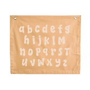 Gender neutral yellow kids room. Gender neutral bright nursery decor. Neutral Alphabet kids banner. Honey yellow abc banner. Boys alphabet wall banner. Surf boys yellow bedroom styling. Boys bright surf bedroom decor. Boys surf bedroom wall banner. Boys fun surf room inspo. Beach boys bedroom inspo. Beach boys bedroom ideas. Coastal boys bedroom inspo. ABC wall banner. Honey yellow boys bedroom decor.