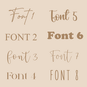 Set of different fonts displayed on a beige background