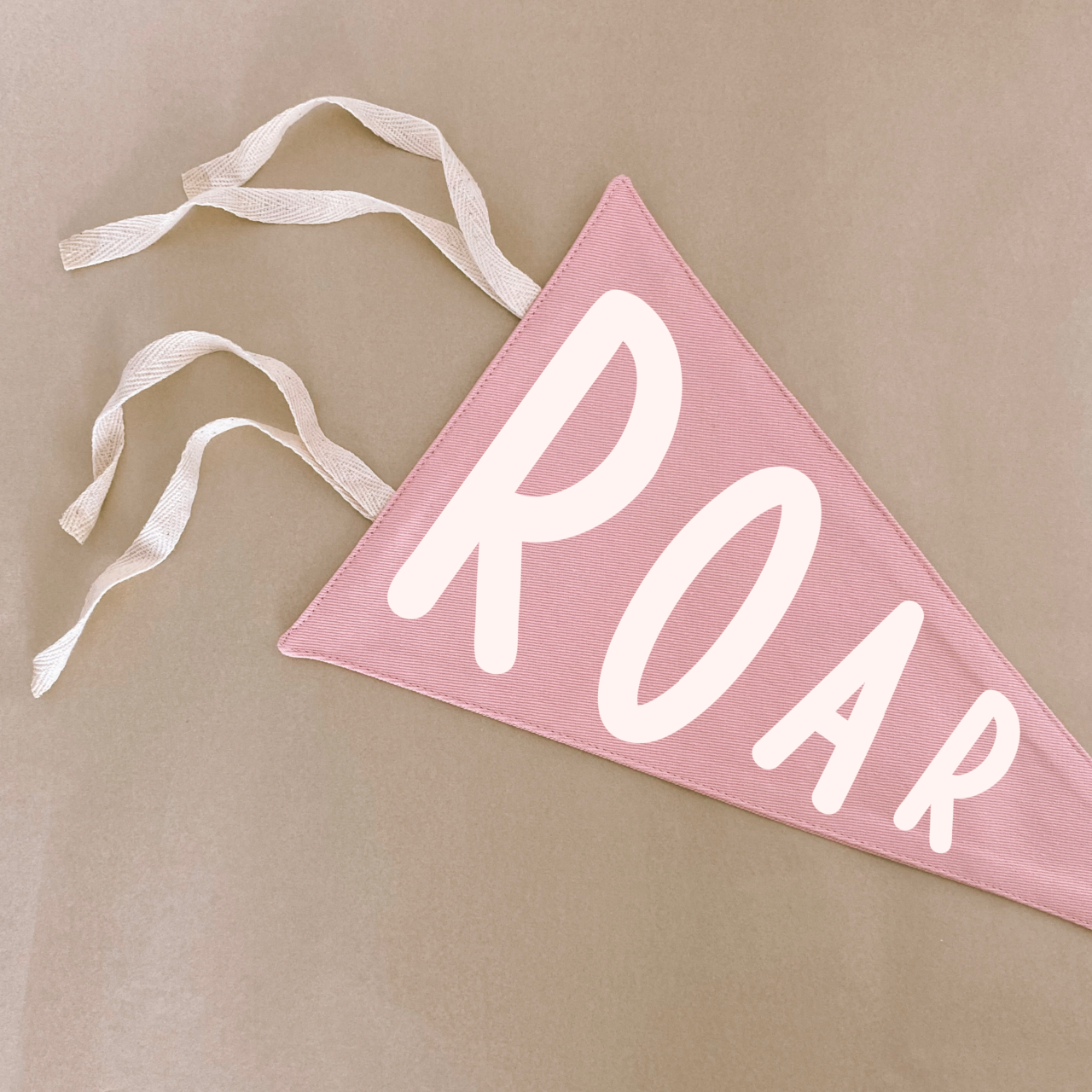 Dinosaur pennant flag. Girls Dino pennant flag. Girls dinosaur wall decor. Girls Dino bedroom. Roar pennant flag. Girls roar wall flag. Girls roar wall banner. Dinosaur pennant flag. Wild bedroom decor. Jungle girls bedroom. Safari girls wall decor. Dino wall decor.