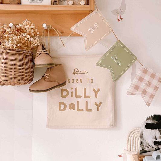 Born to dilly dally. Dilly dally nursery flag. Silly goose nursery flag. Silly goose wall flag. Silly goose bedroom wall banner. Silly goose playroom banner. Kids playroom wall flag. Nursery styling. Toddler bedroom inspo. Toddler bedroom decor ideas. Silly goose nursery decor.