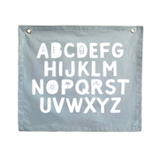 Pastel blue kids room. Soft blue nursery decor. Sky blue Alphabet kids banner. Baby blue abc banner. Boys alphabet wall banner. Surf boys blue bedroom styling. Boys calm surf bedroom decor. Boys surf bedroom wall banner. Boys fun surf room inspo. Beach boys bedroom inspo. Beach boys bedroom ideas. Coastal boys bedroom inspo. ABC wall banner. Pastel blue boys bedroom decor.