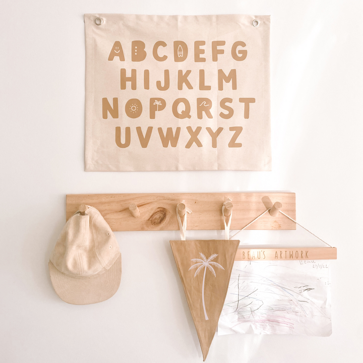 Gender neutral kids room. Gender neutral nursery decor. Neutral Beige Alphabet kids banner. Boys abc banner. Boys alphabet wall banner. Surf boys bedroom styling. Boys surf bedroom decor. Boys surf bedroom wall banner. Boys surf room inspo. Beach boys bedroom inspo. Beach boys bedroom ideas. Coastal boys bedroom inspo. ABC wall banner. Neutral boys bedroom decor.