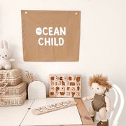 Brown neutral Ocean child banner. Surf Boys bedroom styling. Boys surf bedroom decor. Boys surf bedroom wall banner. Boys surf room inspo. Beach boys bedroom inspo. Beach boys bedroom ideas. Coastal boys bedroom banner. Boys wall banner. Ocean boys bedroom decor. Neutral Tan boys bedroom decor.